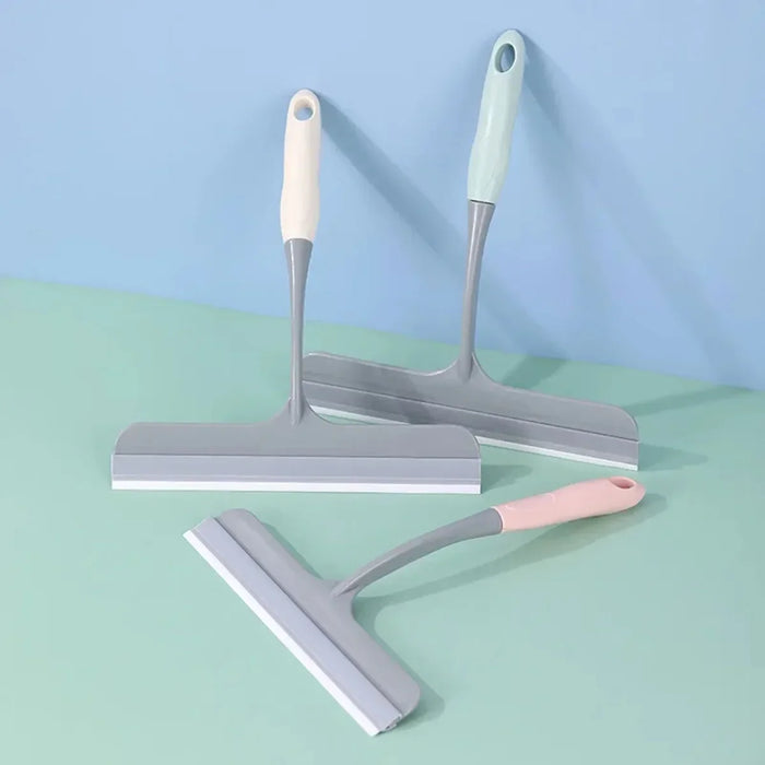 A bathroom shower squeegee for cleaning shower doors and car windows, an efficient surface cleaning tool.